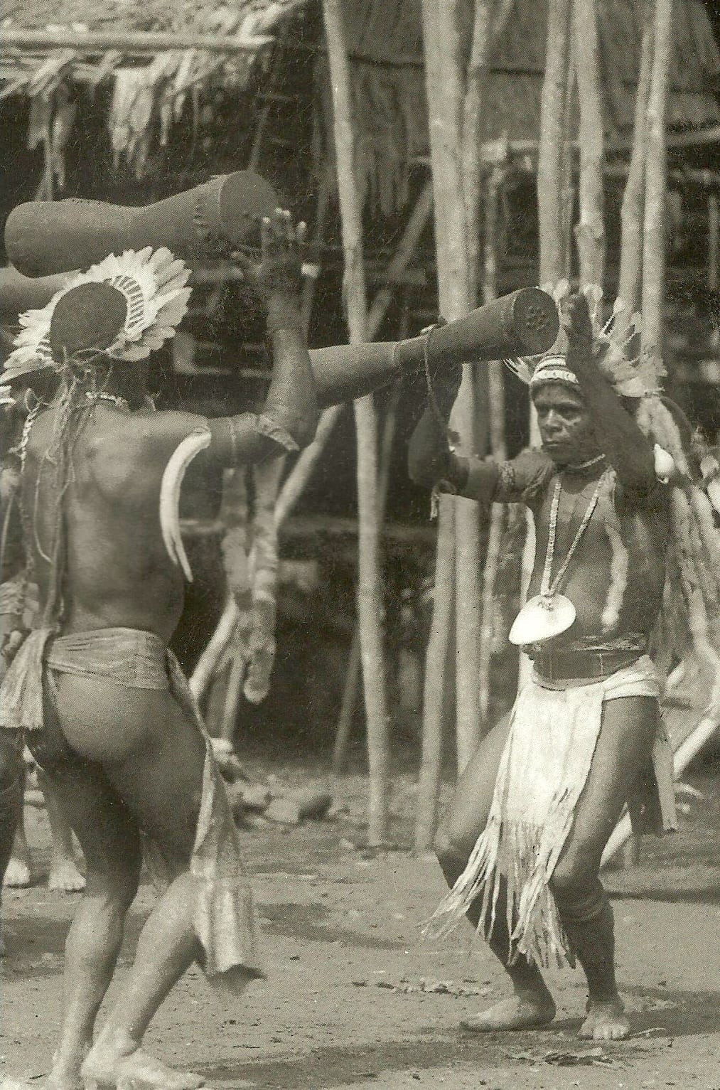 Couples of dancers facing each other and dancing. Koraudi Village. (n.p.)